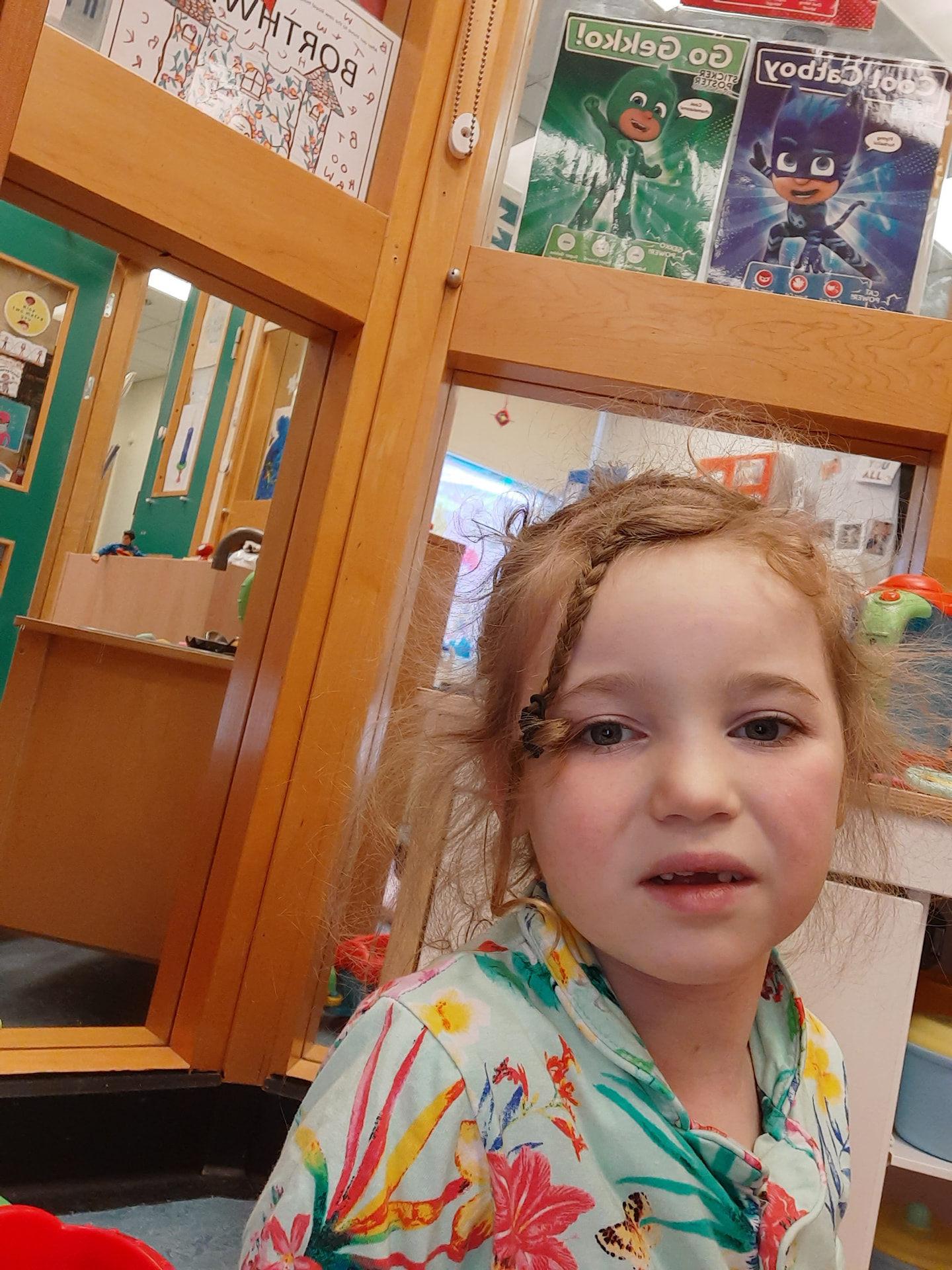 Olivia smiling again in the hospital playroom