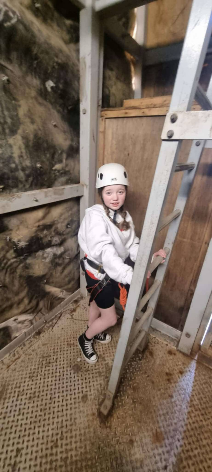 Olivia on a climbing wall adventure